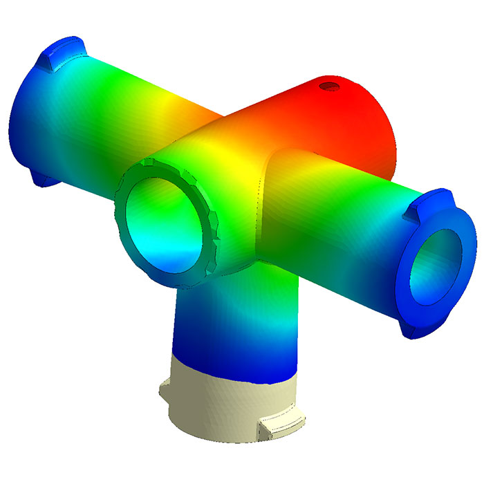Color-coded simulation of a mechanical component in a CAD program, showing stress or flow distribution across the structure.